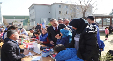 Eroğlu,