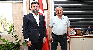 MHP Muratpaşa İlçe Başkanı Sadullah Güneş, Kemer Belediye Başkanı Necati Topaloğlu'nu makamında ziyaret etti