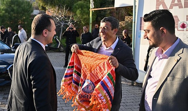 Bornova’da muhtarlarda Eşki’ye teşekkür plaketi