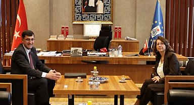 Kahveci, Ercoşman'ı kabul etti
